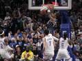 P.J. Washington dunks as he topped the scoring for Dallas in their game 3 win over Oklahoma City. (AP PHOTO)