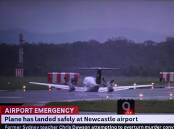 A plane circled above a Newcastle airport for nearly two hours before making an emergency landing. (Supplied by Abc News/AAP PHOTOS)