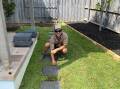 Christian Taylor, 28, owns his own landscaping business after graduating from Taree's TAFE with a Certificate III in Landscape Construction. Picture supplied TAFE NSW