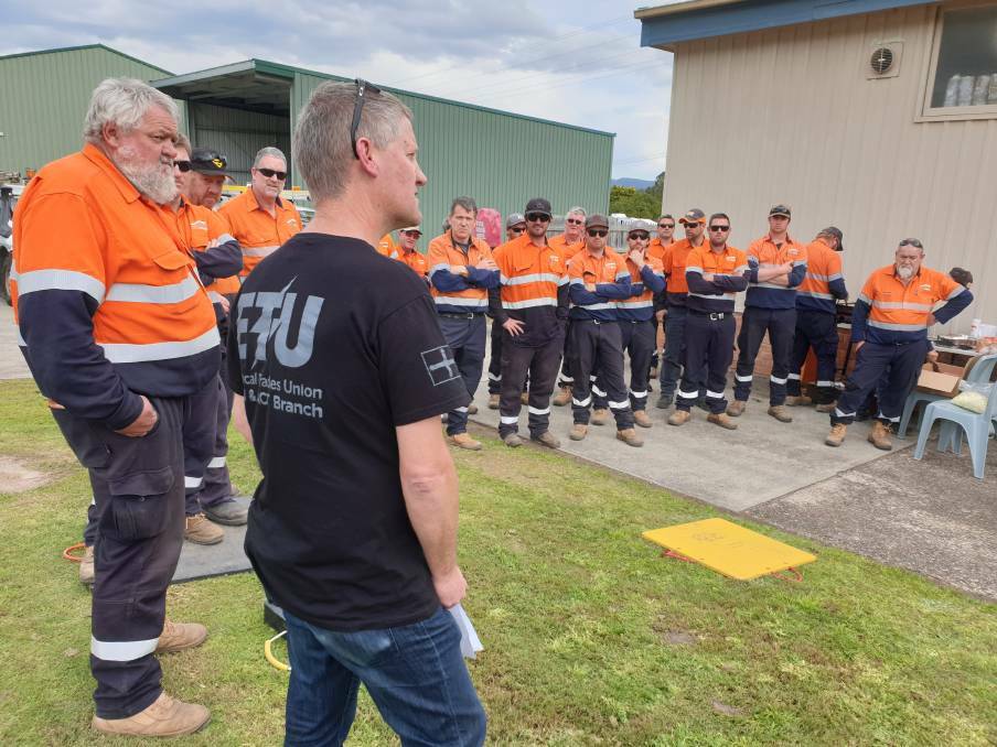 Electrical Trades Union secretary Justin Page speaking to Essential Energy workers in Bulahdelah. Planned job cuts have been halted.