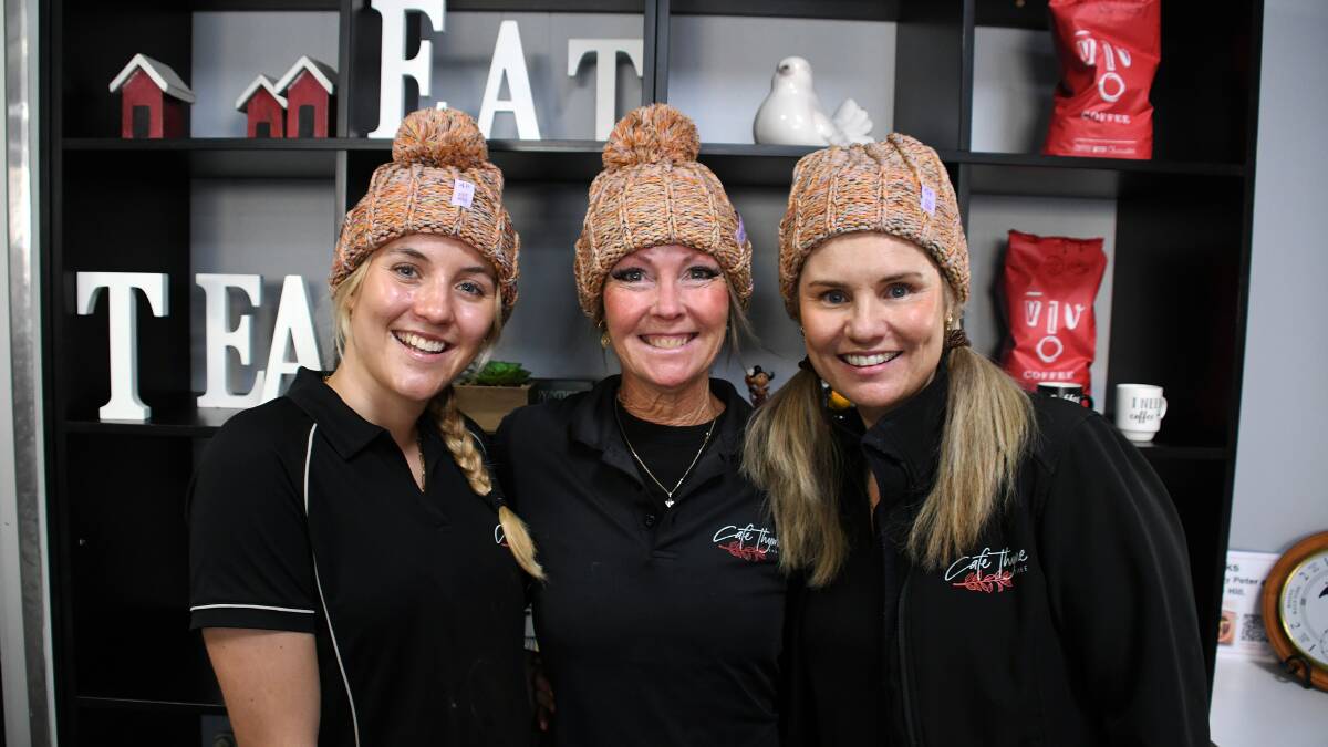 Cafe Thyme's Lexie Ramsay, Sandy Minihan and Nerida Ramsay modelling this year's MHF beanies. Picture by Scott Calvin.