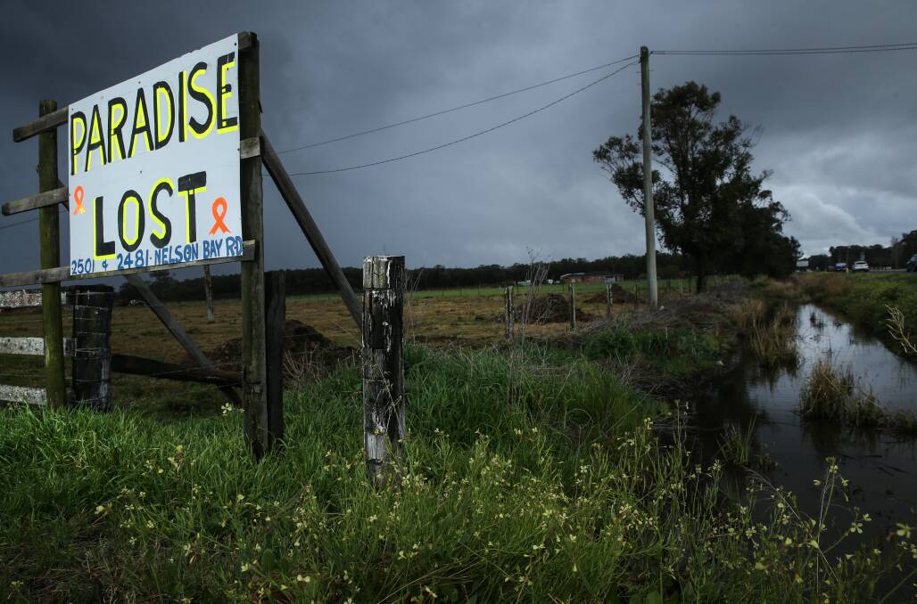 A sign along Nelson Bay Road at Salt Ash in 2018 after contaimination was found. Picture by Marina Neil