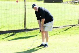 Paul Anlezark about to chip onto the green during a recent round at Taree.