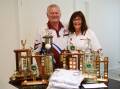 Lois and Errol Ruprecht and their trophy haul for last season at Club West, where both won the bowler of the year award. Picture Scott Calvin.
