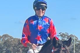 Jockey-trainer Peter Graham on Born Conqueror after the win at Taree on Tuesday. Picture Manning Valley Race Club.