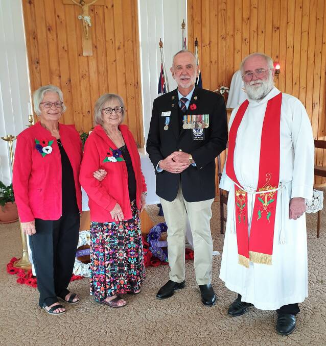 "Poppy ladies" Jenny Fisher and Yvonne Bentley, Ian Dimmock and Fr. Chris Freestone. Photo supplied.