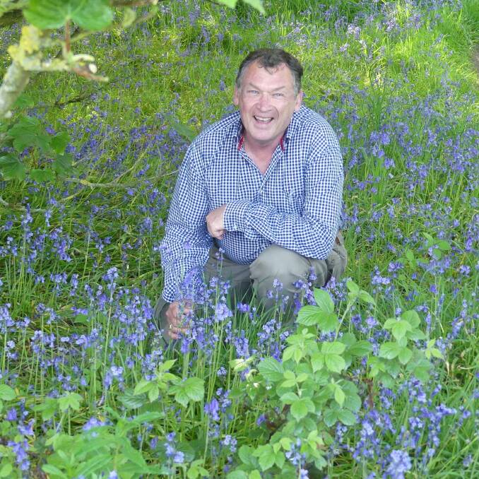George Hoad AM in the bluebell wood at Spout Cottage. Picture supplied