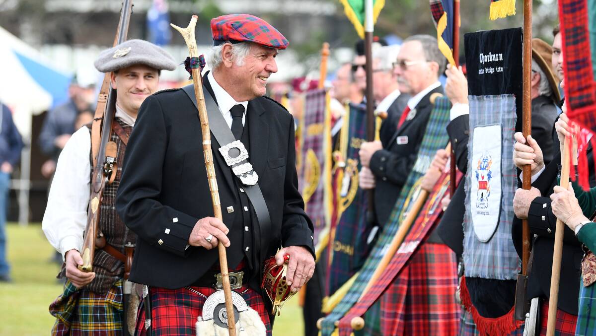 2023 honorary Chieftan Ray Robertson of head of Clan Donnachaidh inspecting the Clans. Picture Scott Calvin