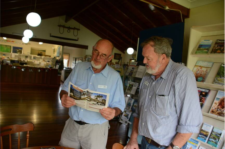 Numbers halved: Bulahdelah Visitor Information Centre volunteers Nigel Weekes and Kevin Carter said the numbers of tourists walking in the centre has halved. 