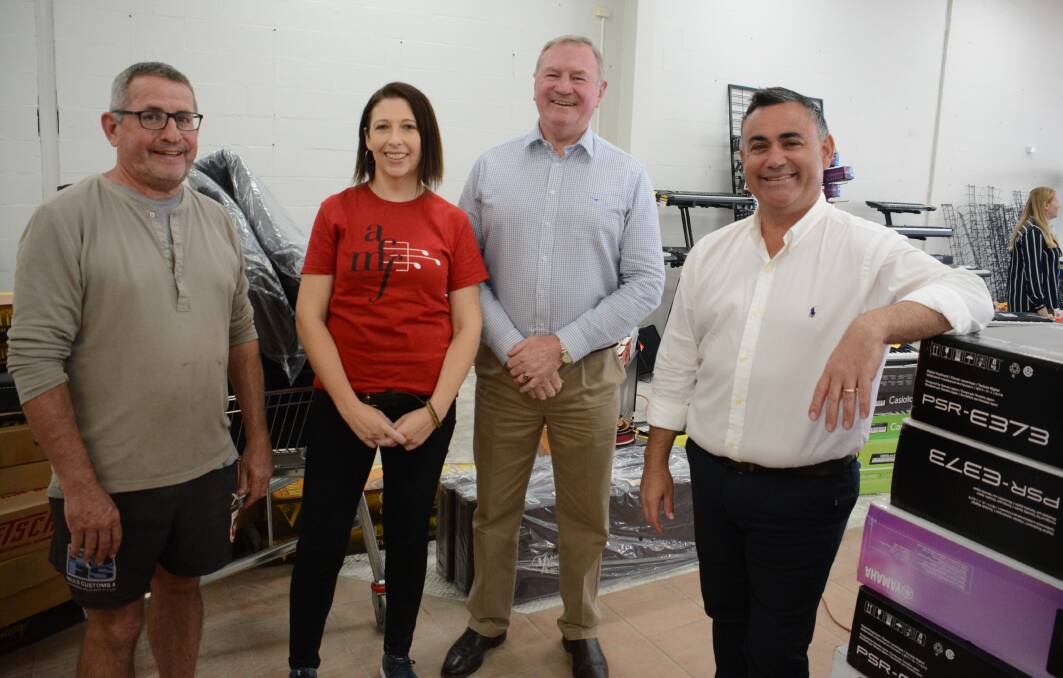 Financial assistance: Taree Sailos manager Barry Murray, Bass'n'Blues Music Megastore co-owner Tanya Brown, Member for Myall Lakes Stephen Bromhead and deputy premier John Barilaro in Taree. Photo: Scott Calvin.